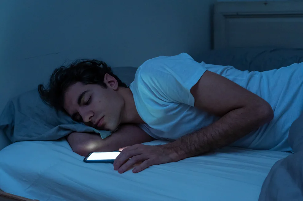 A photo showing a man having quality sleep.